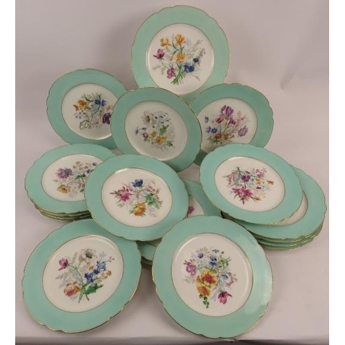 84 - A set of 18 hand finished Sevres porcelain plates each with a central floral decoration. Marked Macé... 