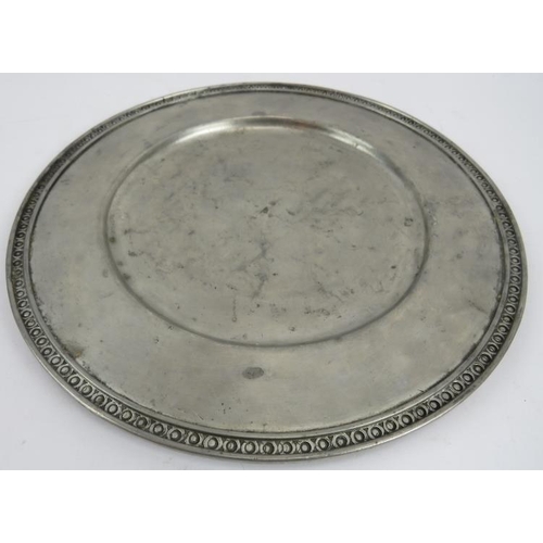 85 - A set of eight large French pewter platters in traditional style, each marked GT Etain. Diameter 33c... 