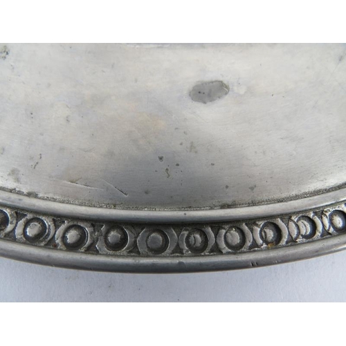 85 - A set of eight large French pewter platters in traditional style, each marked GT Etain. Diameter 33c... 