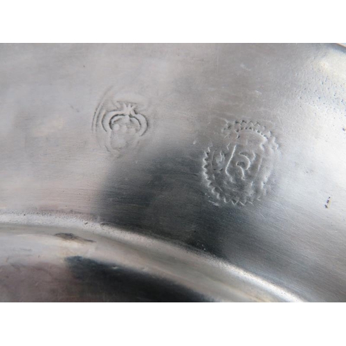 85 - A set of eight large French pewter platters in traditional style, each marked GT Etain. Diameter 33c... 