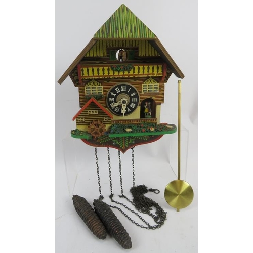 94 - A mid century German cuckoo clock with moving figures. Needs restoration.
Condition report: Currentl... 