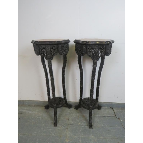 703 - A pair of antique Chinese rosewood two-tier plant stands, the shaped tops with inset red marble, abo... 