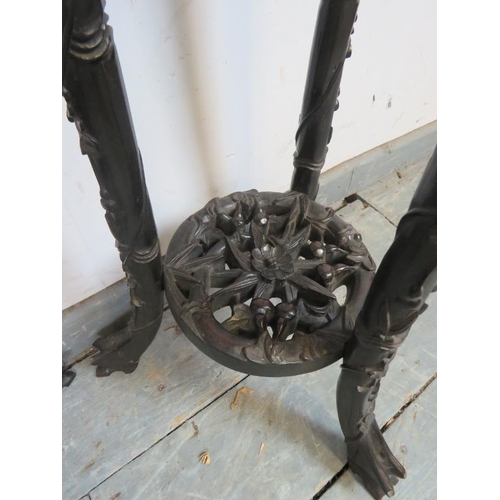 703 - A pair of antique Chinese rosewood two-tier plant stands, the shaped tops with inset red marble, abo... 