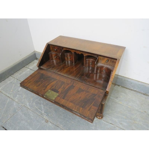 705 - A fine 19th century figured walnut table-top writing desk in the Queen Anne taste, the fall front op... 