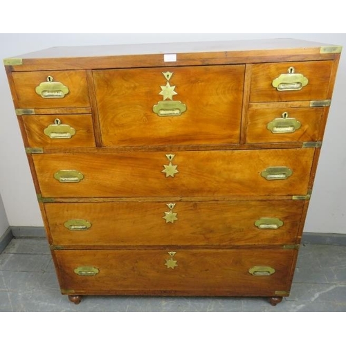 713 - An exceptional 19th century Irish walnut and brass bound military campaign chest, attributed to Greg... 