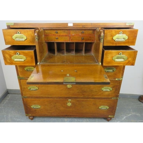 713 - An exceptional 19th century Irish walnut and brass bound military campaign chest, attributed to Greg... 