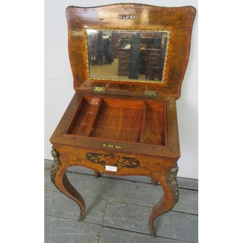 715 - A 19th century French taste burr walnut ormolu mounted crossbanded work-table, the fitted interior w... 