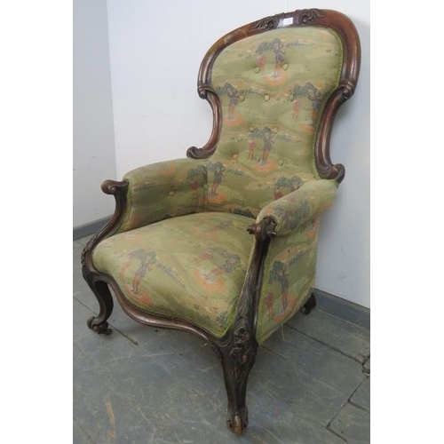 722 - A Victorian mahogany show-wood armchair, featuring carved acanthus scrolls, upholstered in golfing i... 