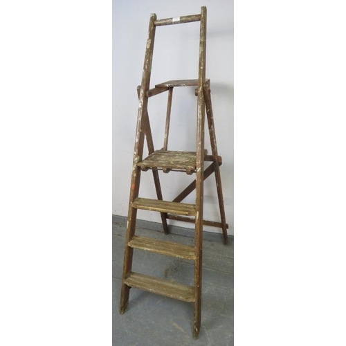 724 - An unusual vintage double platform stepladder by ‘Spelga’.
H168cm W56cm D85cm (approx).
Condition re... 