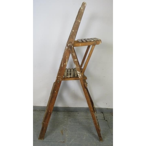 724 - An unusual vintage double platform stepladder by ‘Spelga’.
H168cm W56cm D85cm (approx).
Condition re... 