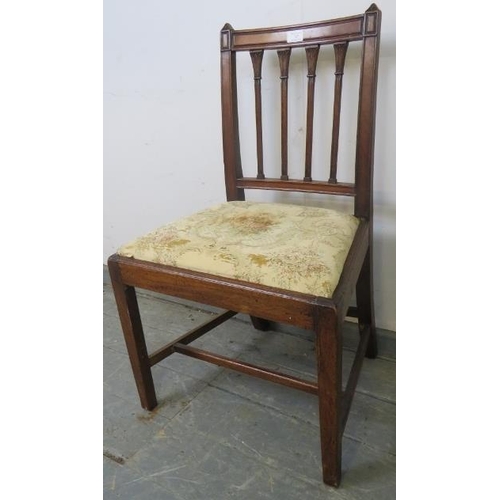 727 - A Georgian oak occasional chair with carved finials and spindles, on tapering square supports with s... 