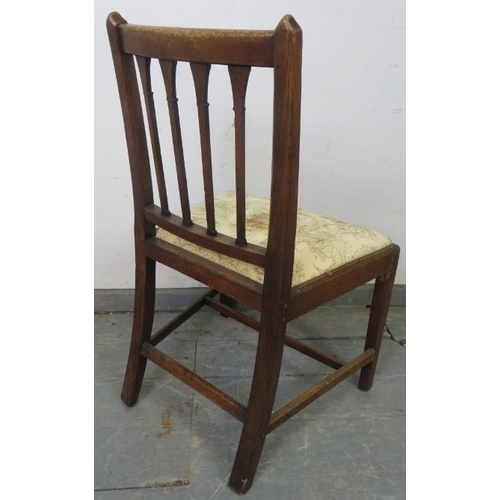 727 - A Georgian oak occasional chair with carved finials and spindles, on tapering square supports with s... 