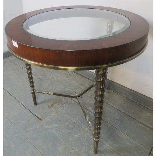 730 - A vintage Art Deco style mahogany circular table, with bevelled glass insert, on brass spiral suppor... 