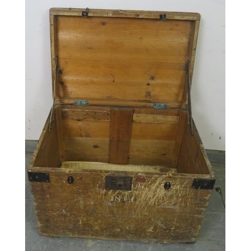 732 - A 19th century pine flat top steamer trunk, bearing hand painted date ‘1844’. 
H45cm W67cm D44cm (ap... 