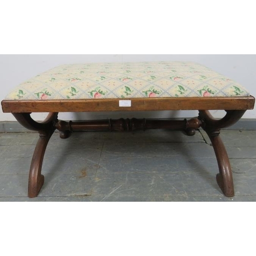 733 - A substantial Victorian rosewood ‘X-frame’ stool, upholstered in tapestry material, on curved suppor... 