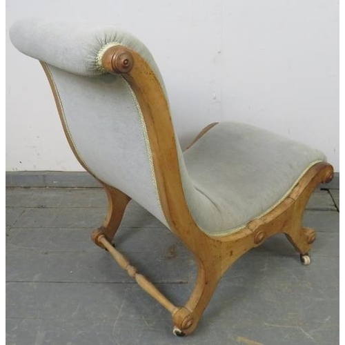 734 - A Victorian beech slipper chair, upholstered in grey material with silver braiding, on scrolled supp... 