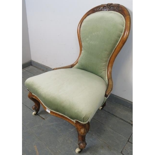 735 - A Victorian walnut spoonback bedroom chair, upholstered in pale green velvet material with matching ... 