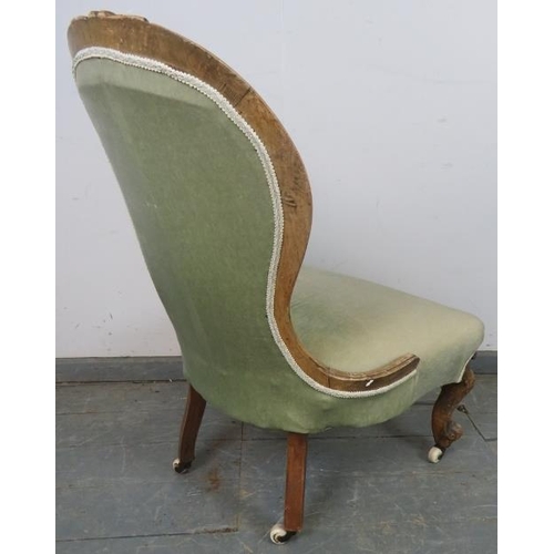 735 - A Victorian walnut spoonback bedroom chair, upholstered in pale green velvet material with matching ... 