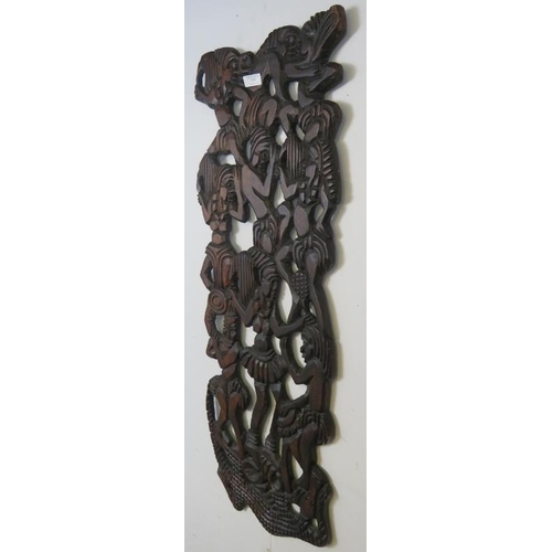 737 - A vintage African hardwood carved and pierced wall-mounted panel, depicting figural motifs. 
H118cm ... 