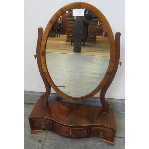 750 - An Edwardian Regency Revival mahogany oval swing mirror, strung with satinwood, above a serpentine b... 