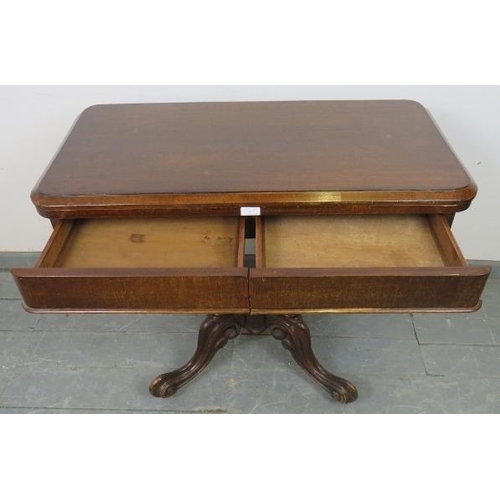 756 - A Victorian oak and mahogany turnover card table, with green baize and two blind drawers under, over... 