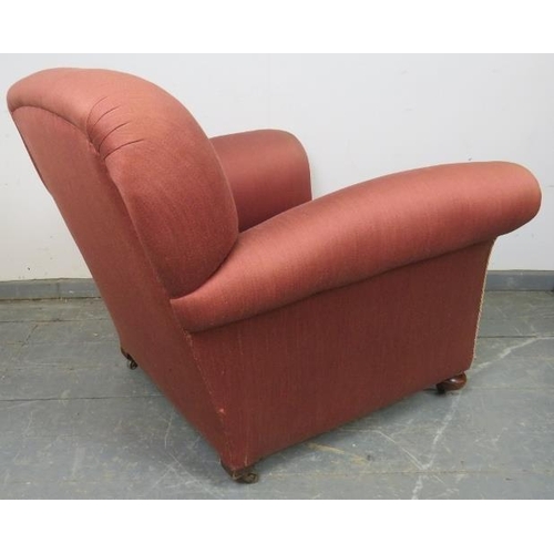 764 - An Edwardian club armchair, re-upholstered in light burgundy material with silver braided rope trim,... 