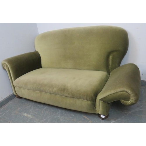 772 - An Edwardian drop-end sofa of small proportions, re-upholstered in green velvet material, on bun fee... 