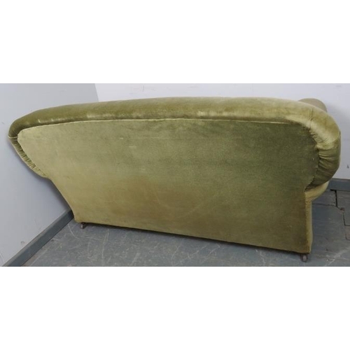 772 - An Edwardian drop-end sofa of small proportions, re-upholstered in green velvet material, on bun fee... 