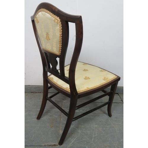 778 - An Edwardian mahogany bedroom chair, with marquetry inlay and strung with satinwood, upholstered in ... 