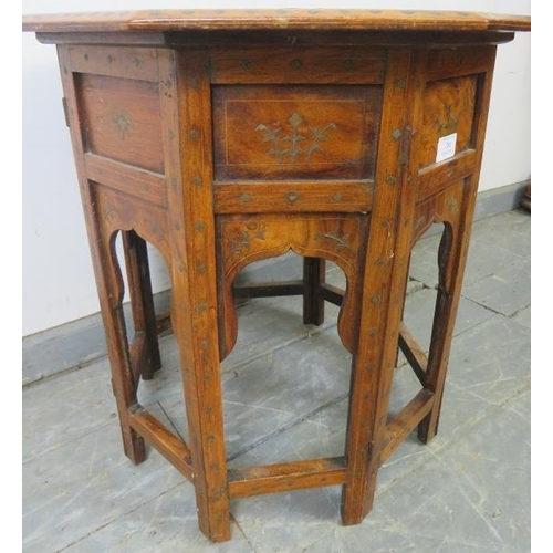 781 - An early 20th century Islamic hardwood octagonal occasional table, featuring brass and parquetry inl... 