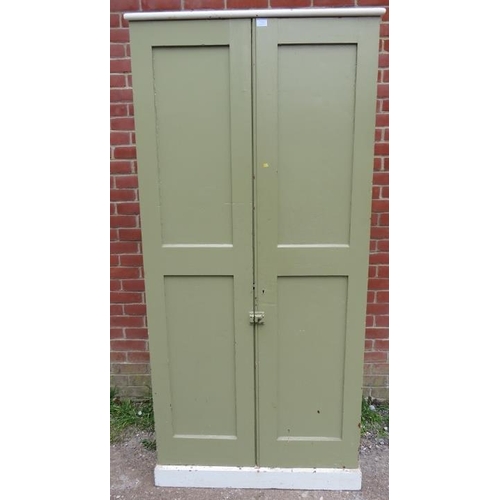 784 - An antique pitch pine tall pantry cupboard, the panelled doors opening onto five loose shelves, on a... 