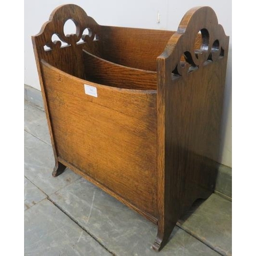 788 - An Art Deco Period medium oak magazine rack, with pierced sides, on carved supports. 
H46cm W39cm D2... 