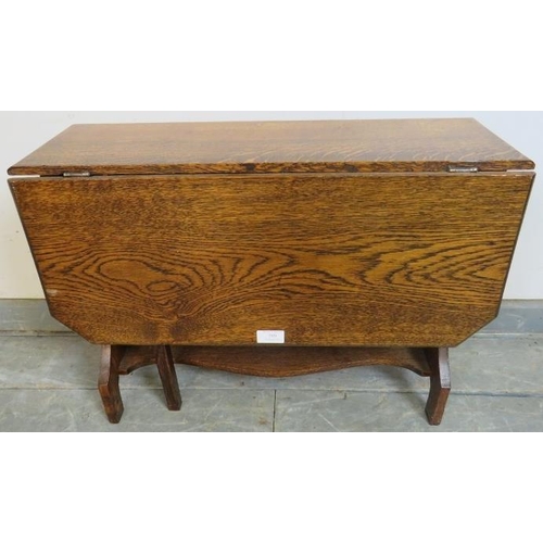 789 - An Art Deco Period medium oak Sutherland table, with pierced sides and shaped middle stretcher, on s... 