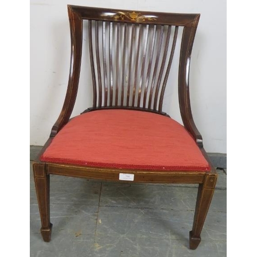 798 - An Edwardian mahogany bedroom chair, marquetry inlaid and strung with satinwood, the steeply raked b... 