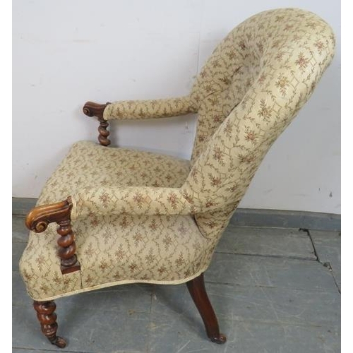 799 - A Victorian walnut open-sided armchair, with barley twist uprights and scrolled arms, upholstered in... 