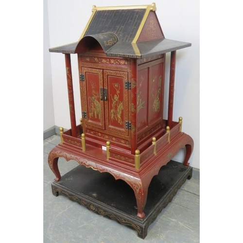 802 - A vintage Chinese temple cabinet, the red lacquer hand painted with traditional scenes and gold acce... 