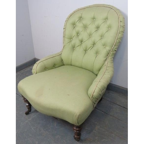 829 - A Victorian bedroom chair, reupholstered in green buttoned material, on tapering walnut supports wit... 