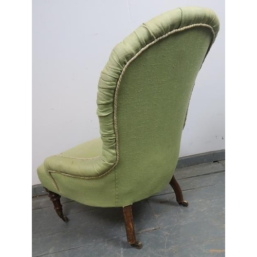 829 - A Victorian bedroom chair, reupholstered in green buttoned material, on tapering walnut supports wit... 