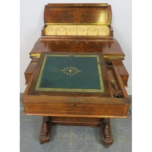 831 - A Victorian burr walnut Davenport, the raised gallery with fitted stationary compartment, above a sl... 