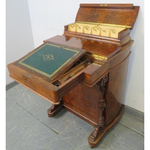 831 - A Victorian burr walnut Davenport, the raised gallery with fitted stationary compartment, above a sl... 