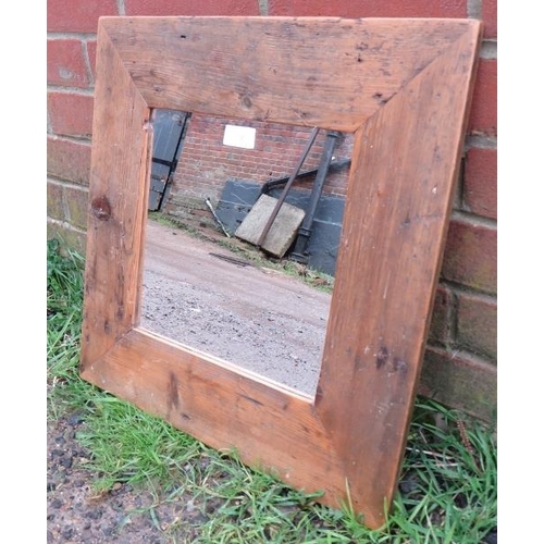 832 - A square wall mirror in an antique pine surround. H49 W49 (approx).
Condition report: No issues.