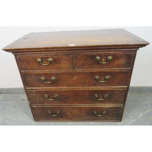 835 - An early 18th century oak chest housing two short over three long graduated cock-beaded drawers with... 