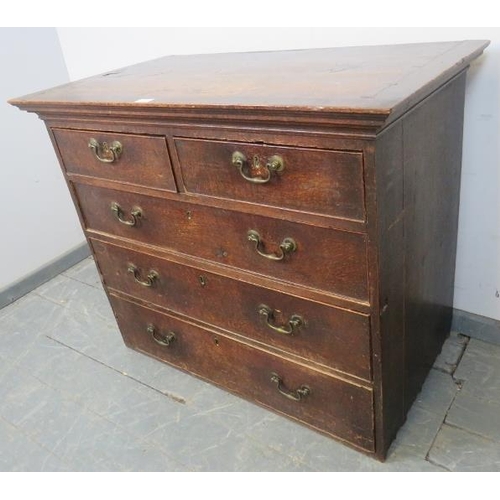 835 - An early 18th century oak chest housing two short over three long graduated cock-beaded drawers with... 