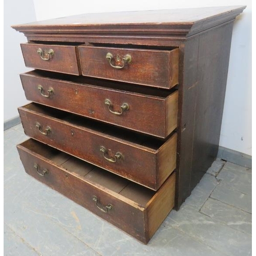 835 - An early 18th century oak chest housing two short over three long graduated cock-beaded drawers with... 