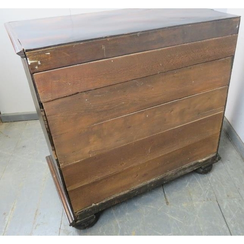 839 - An  antique Jacobean-style elm chest of four long graduated drawers with geometric mouldings and bra... 