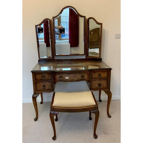 843 - A 1920s burr walnut bedroom suite comprising a double bed, triple wardrobe, compactum, bedside cabin... 