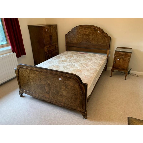 843 - A 1920s burr walnut bedroom suite comprising a double bed, triple wardrobe, compactum, bedside cabin... 