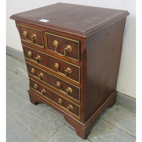 844 - A vintage walnut apprentice style chest of two short over three long cock-beaded drawers with brass ... 