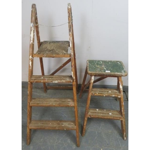 847 - A small vintage step ladder, together with another set of small vintage folding steps. 
Largest H110... 