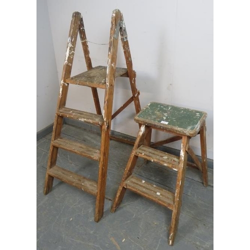 847 - A small vintage step ladder, together with another set of small vintage folding steps. 
Largest H110... 